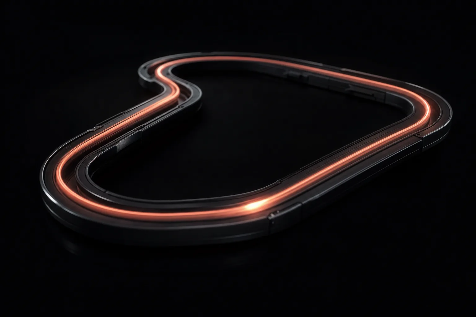 A closed dark metal track in darkness with a bright orange light running around it, leaving a trail